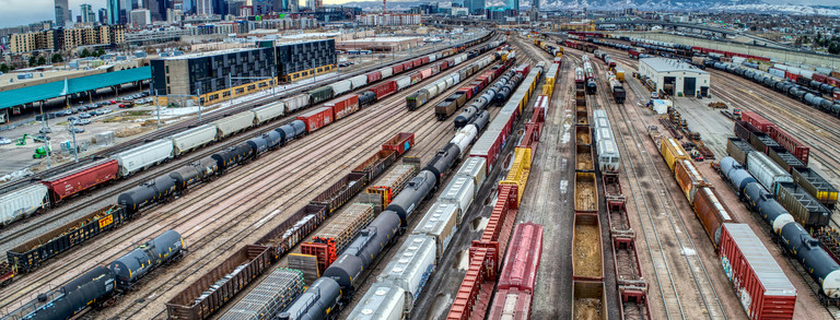 A picture of cargo trains on dozens of tracks next to one another